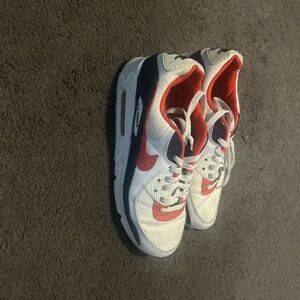 Nike White and Red Sneakers with Air Cushioning